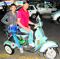 Jagdish Lohar on his scooter in Amritsar on Wednesday