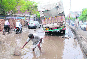 A truck stranded on a waterlogged road near DAV College in Bathinda on Wednesday.