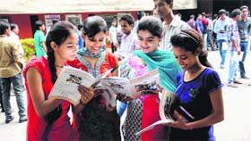 Students go through the prospectus for admission to Class XI at Government Girls Senior Secondary School in Sector 20, Chandigarh