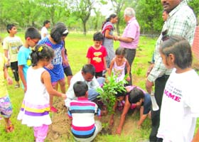 Go Green: Children take part in a plantation drive organised by Panjab University Staff Club in Sector 14, Chandigarh, on Wednesday