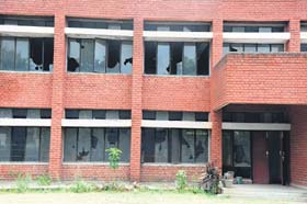 Broken windowpanes at the community centre in Sector 56, Phase VI, in Mohali
