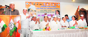 Uttarakhand Chief Minister Vijay Bahuguna addresses a meeting of Congress Sewa Dal workers in Dehradun on Wednesday.