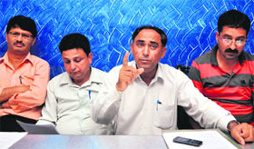 Office-bearers of the Jagti Tenement Committee address mediapersons in Jammu on Wednesday.