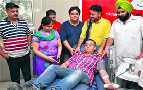 Members of NGO Prayas donate blood in Jammu on Wednesday.