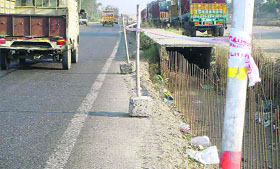 Pointed irons rods pose a risk to commuters in Doraha.