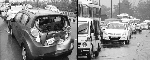 The car that was damaged in a pile-up on the railway flyover at Dera Bassi; and (right) a long queue of vehicles stuck in a traffic jam due to the mishap, on Thursday.
