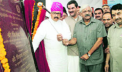 Jitender Singh, Union Minister of State for Sports, along with Satpal Maharaj, Pauri Garhwal MP, and Uttarakhand Sports Minister Dinesh Aggarwal, lays the foundation stone of a multi-purpose sports hall at Sports College, Raipur, near Dehradun on Thursday