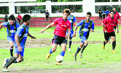 Players in action during a match in the 4th ONGC BS Negi Memorial Cricket Tournament being played at Ambedkar Stadium in Dehradun on Thursday