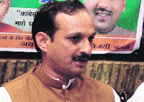 State BJP president Satpal Satti addresses mediapersons in Mandi on Thursday