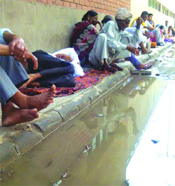 Rainwater accumulated outside the emergency unit at the PGI, Chandigarh.
