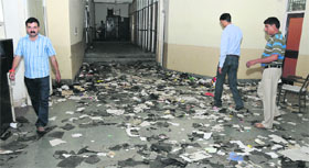 With safai karamcharis on strike for the last 33 days, garbage piles up in the Administrative block of Jammu University.