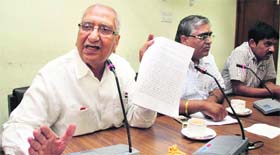 Satpal Gosain, former Health Minister, addresses a press conference in Ludhiana on Friday