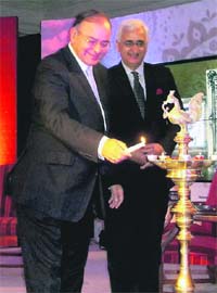 BJP leader Arun Jaitley lights the lamp with Union Minister Salman Khurshid at the first India Day event at Oxford University