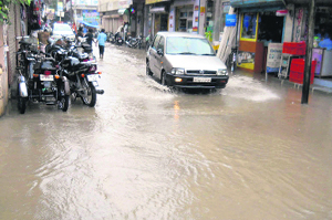 A waterlogged road at a market in Sirhind on Saturday.