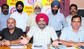 Members of Punjab State District DC Office Employees Union in Jalandhar on Saturday