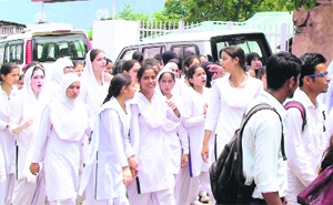 Students of the Government Higher Secondary School hold a protest in Batote.