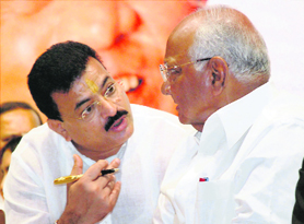 NCP chief Sharad Pawar (R) with newly-elected Maharashtra party president Bhaskar Jadhav in Mumbai on Saturday
