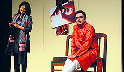 Artistes enact a scene from the play "Hum Suffer" at the Tagore Theatre in Chandigarh on Sunday