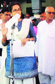 Public Health Engineering Minister Kiran Choudhry addresses a gathering in Bhiwani on Sunday. 