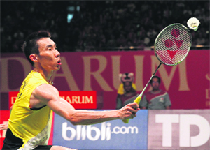 Lee Chong Wei competes against Marc Zwiebler during singles final on Sunday.