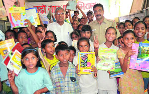 Children with their gifts during the launch of the campaign at the Bapu Dham Colony in Chandigarh. 