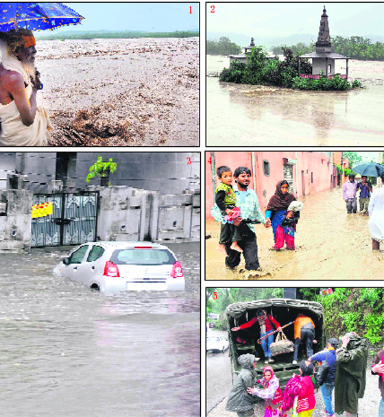 A sadhu looks at the swollen Ganga in Haridwar on Monday; a submerged temple at Neeldhara; a car half submerged in flood waters on a road; people wade through knee-deep water in the Bairagi area and Army men shift stranded pilgrims to camps at Joshimath in Chamoli district. 