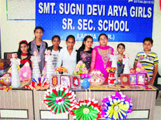 Participants display art and craft items at the 15-day summer camp organised by Sugni Devi Arya Girls Senior Secondary School, Ladwa.