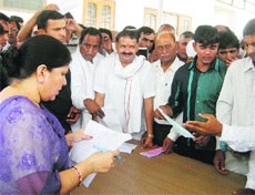 Education Minister Geeta Bhukkal listens to public grievances in Jhajjar on Sunday. 