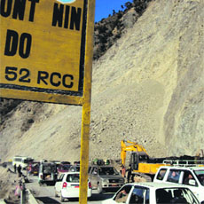Traffic jam caused due to quarrying at Seri in Ramban on Monday. 