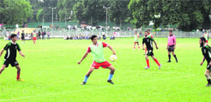 Players in action during a match in Srinagar on Monday. 