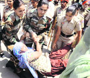 Members of the Unemployed Linesmen Union being taken into custody in Patiala on Monday.