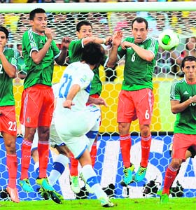 Andrea Pirlo scores Italys first goal in their 2-1 win over Mexico in Confederations Cup on Sunday