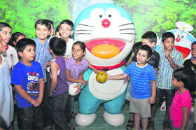 get animated: Children having fun with Doraemon.