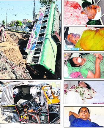 The bus that fell in a ditch along the airport road; and (below) the auto-rickshaw, which was damaged in the accident, in Amritsar on Tuesday. Photos: Vishal Kumar (right) Injured passengers get treatment at Guru Nanak Dev Hospital in Amritsar on Tuesday