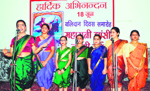 Children perform a group song during a function to commemorate the martyrdom day of Rani Laksmi Bai in Amritsar on Tuesday. 