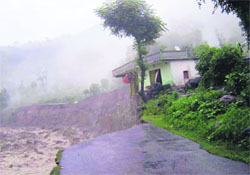 A road that was washed away in Ghattabagar village in Pithoragarh.