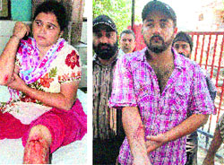 An injured Ravinder Kaur and her son Amandeep Singh. 