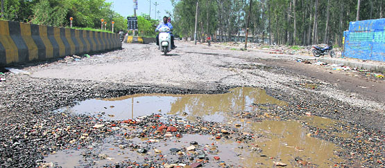  The road linking Choggitti with Ladowali in a dilapidated condition in Jalandhar. Tribune Photo: Malkiat Singh