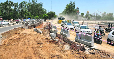 Vehicles pass through the new Sidhwan Canal bridge in Ludhiana on Tuesday. 