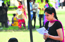 A student on her way to the examination hall at Punjab Agricultural University in Ludhiana on Tuesday. 