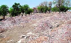 A view of the razed government quarters on the Power House road in Bathinda