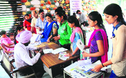 Students submit admission forms at Government Girls Senior Secondary School in Sector 20, Chandigarh, on Wednesday. Tribune Photo: S. Chandan