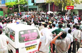 Residents block traffic in Sector 5, Gurgaon, after the death of a person in an accident with a dumper on Wednesday