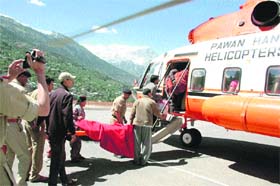 Tourists evacuated from a cloudburst-hit area in a state helicopter from Kinnaur district on Wednesday