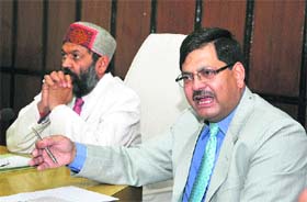 Dinkar Buratokhi, Director, Higher Education, addresses mediapersons at HPU in Shimla on Wednesday