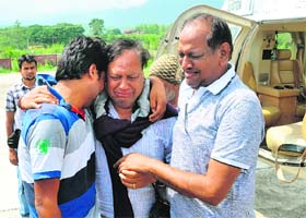 SAFE, FINALLY: Pilgrims after evacuation from a flood-hit area