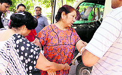Paramjit Kaur, the deceased realtor Lehmber Singh's wife at the Civil Hospital