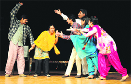 Artistes enact a scene from the play "Doctor Ulta Pulta" at the Tagore Theatre, Chandigarh, on Thursday.