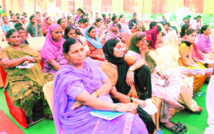 Women attend an awareness programme on “Crime against Women and Children” and “Anti-Human Trafficking” organised by the UT police at Dadu Majra Colony in Chandigarh on Thursday.