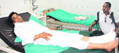 A Kedarnath resident rescued by the Army being treated at Doon Hospital in Dehradun on Wednesday. Tribune photo: Vinod Pundir